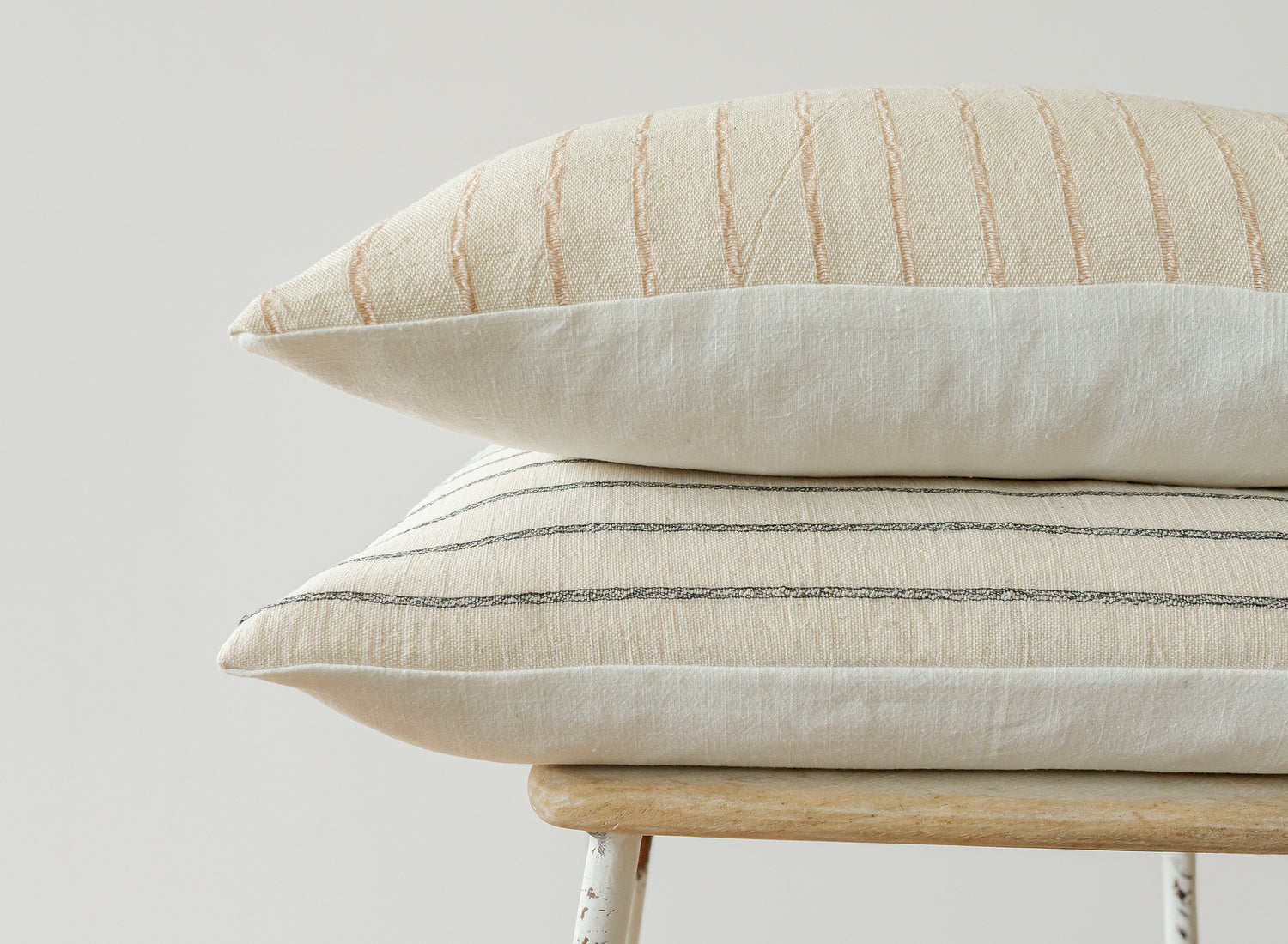 Fleck and Twine Handmade designer cushion covers on stool